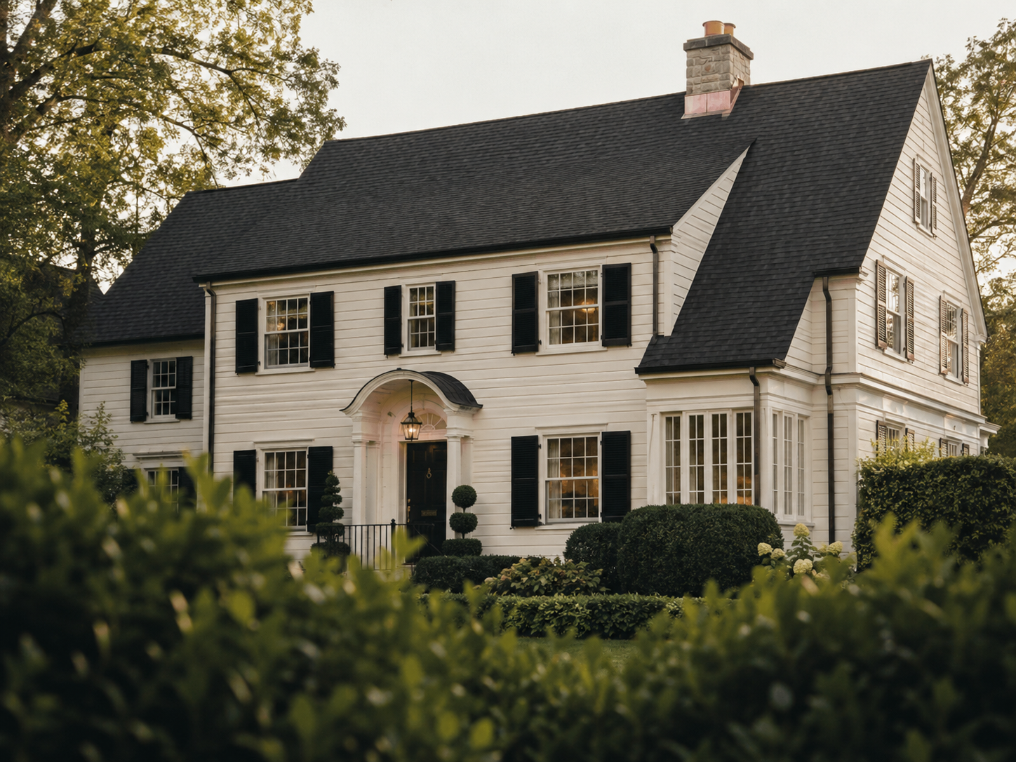 Tudor-revival home with new architectural-asphalt roof